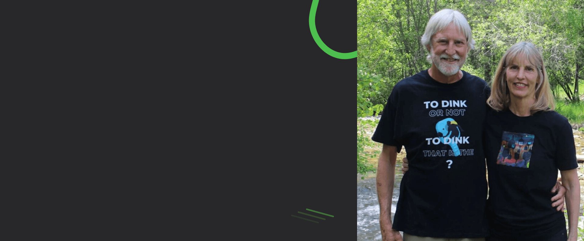 Image of Suzy & Stuart in Pickleball tees with stream and trees in the background.